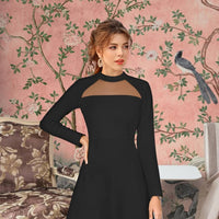 Model in black monochrome dress – soft palace lighting, poised stance