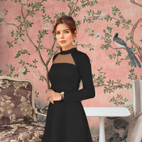 Closeup of sheer neckline – soft contrast against bold black fabric