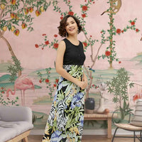 Side profile of the rayon dress in motion, showcasing the dusk-to-dawn gradient effect
