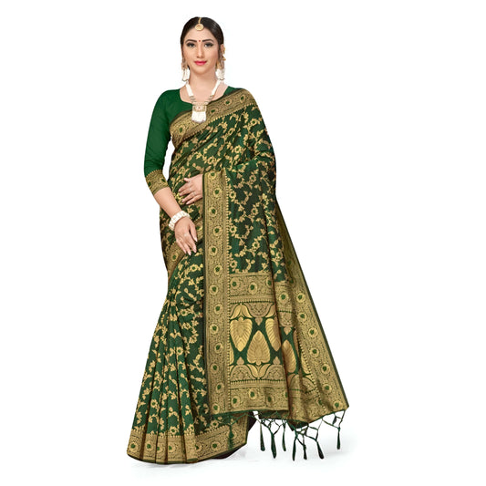 Macro of gold floral motifs on dark green silk, pure white background