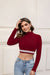  Front view against warm walls—maroon that mesmerizes