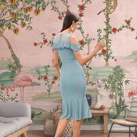 Back angle: How fabric clings then flares like a good punchline