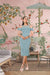  Front view: Dress plotting world domination via ruffled shoulders