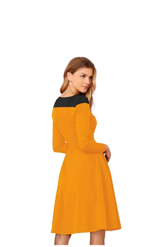 Back view of dress with full sleeves and stretchable knit fabric, cut out on white background.