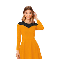 Front view of Golden Contrast yellow knit dress with black accents, isolated on white for clean display.
