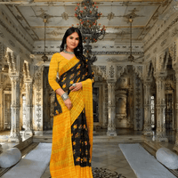 Yellow-black georgette saree glowing in sunlight – solar-lunar contrast