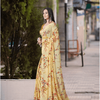 Saree under spotlights highlighting artistic textures