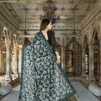 Professional woman wearing green Lycra office saree - no ironing needed for busy workdays