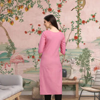 Back view of CELESTINA pink cotton kurti in palace setting
