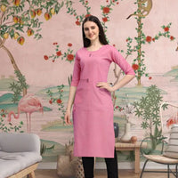  Front view of pink cotton straight kurti in elegant room