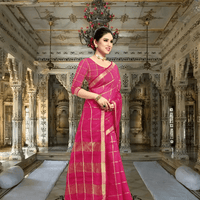 Close-up of blouse back design and pallu drape, red-pink harmony highlighted in traditional temple setting