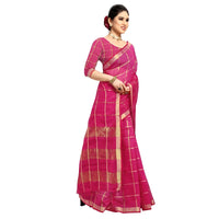 Studio shot of model in pink Kota Doria saree, golden checkered pattern catching light, red border forming delicate contrast