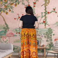 Back view showing flowing fabric and design
