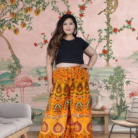  Front view of yellow Jaipur print palazzo pant in royal setting