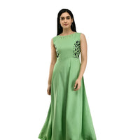  Front studio shot of green sleeveless gown by CELESTINA