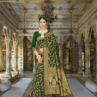 Detailed shot of abstract gold motifs on green silk with antique ambiance