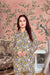 Front view of green printed rayon co-ord set with detailed collar – lifestyle background