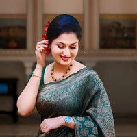 Side profile with hand on waist, soft green glow visible
