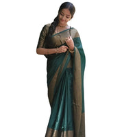 Studio front pose of green Lichi silk saree with neat draping – white background