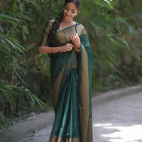 Front view of 💚 Hiranyasnehi green Lichi silk saree draped gracefully – lifestyle background