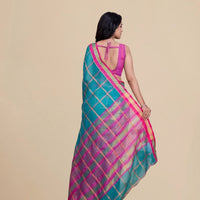 Studio rear view highlighting unstitched blouse and pallu shape
