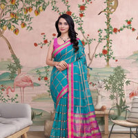  Front angle of Rama green saree glowing in traditional palace interior