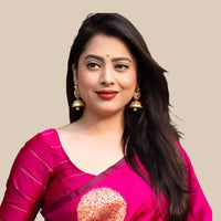  Front view of pink silk printed saree in royal setting