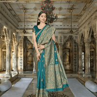 Emerald saree in monsoonal light, gold borders cutting like lightning through vines