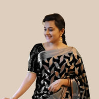 Studio front view of printed black Litchi silk saree