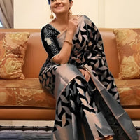 Studio front view of printed black Litchi silk saree