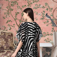 Back side of CELESTINA black short sleeve shrug