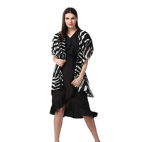  Front studio image of short sleeve black shrug by CELESTINA