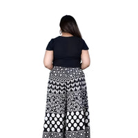 Back waistband and flowing cut clearly displayed