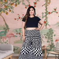 Front view with ethnic black print flowing in natural light