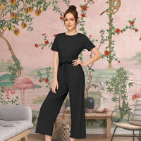 Left profile highlighting fabric stretch and waist curve – lifestyle background