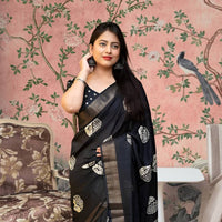 Front view of 🖤 Kaatyaayani black printed cotton crape saree – styled in ethnic setting