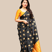 Studio front view of black silk saree with yellow blouse contrast