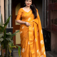 Studio front view of yellow saree showing print and elegant shape