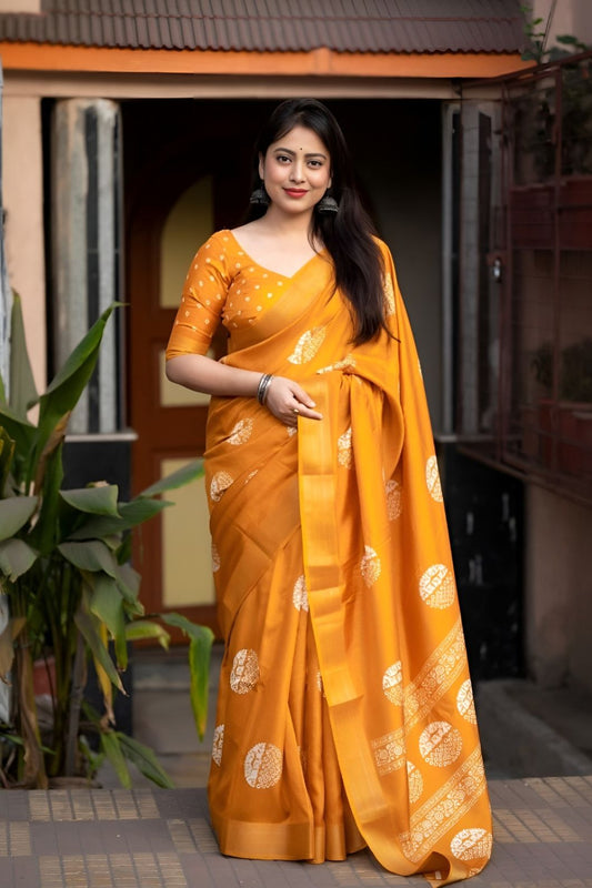 Studio front view of yellow saree showing print and elegant shape
