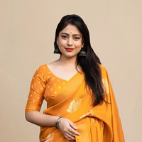 Studio front view of yellow saree showing print and elegant shape