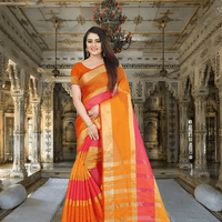 Model basking in golden sunlight, saree glowing in saffron orange with soft drape