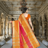 Movement shot capturing pallu in the air, gold border gleaming with contrast
