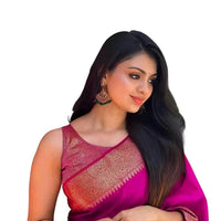 Studio front pose of soft pink silk saree draped neatly – white background