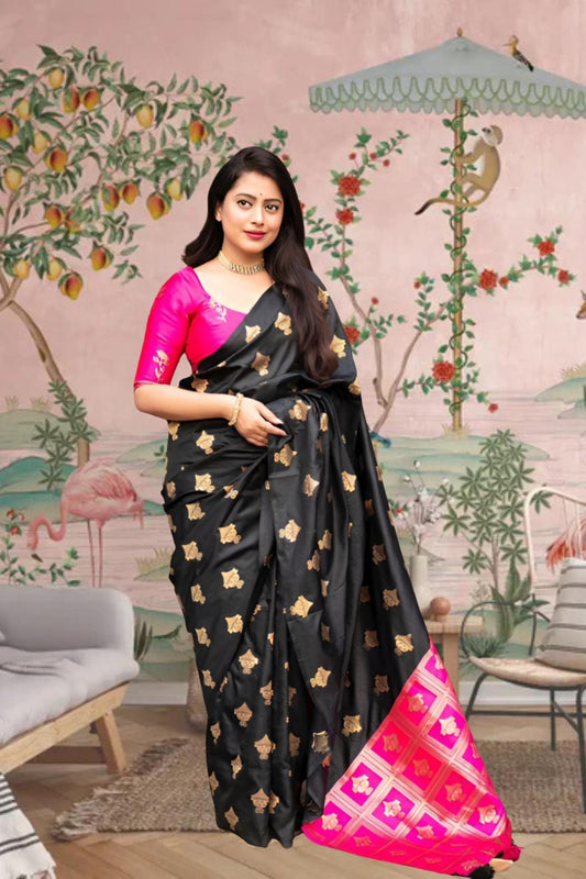  Front view of black silk saree with pink blouse in royal setting