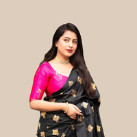 Studio front view of black silk printed saree with pink blouse