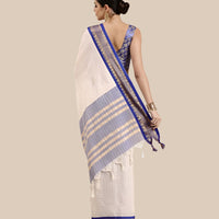 Studio back shot showing pallu flow and checkered depth