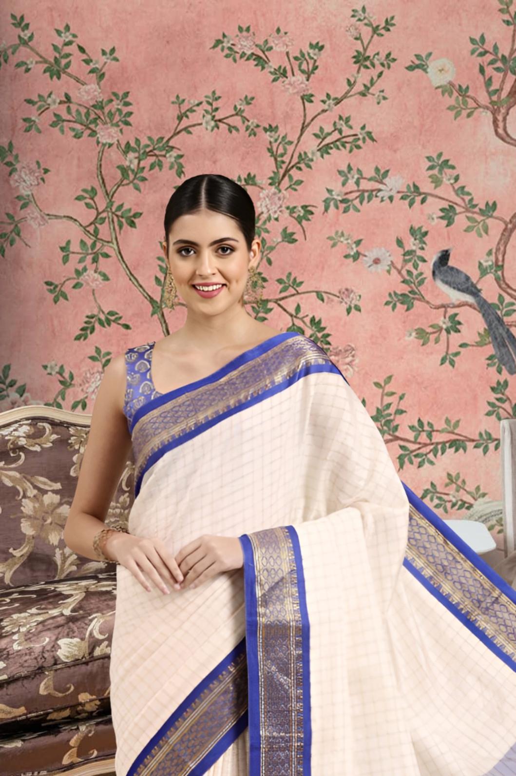 Front view of royal blue checkered saree in regal setting