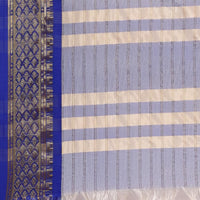 Studio close-up showing texture and vibrant blue sheen