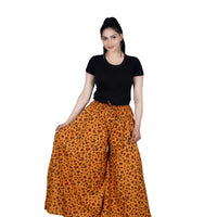  Isolated front view of saffron-orange palazzo pants