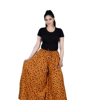 Isolated front view of saffron-orange palazzo pants